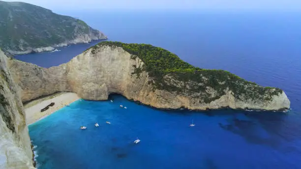 Photo of Navagio bay and Ship Wreck beach in summer. The most famous natural landmark of Zakynthos, Greece