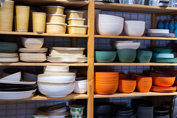 istock Shelves with dishware at household goods store 1354055286