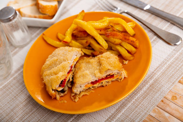 istock Goat cheese and pepper booklets with fries 1354055322