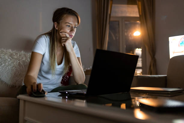 istock Woman using dating app on laptop 1354061934