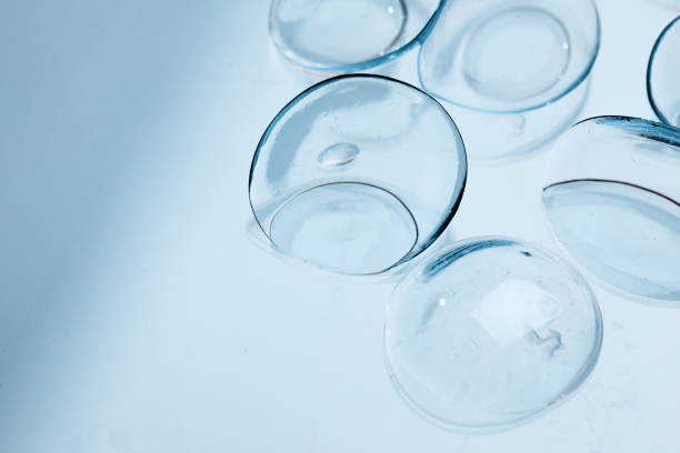 istock contact lenses on blue background close up view 1354062043