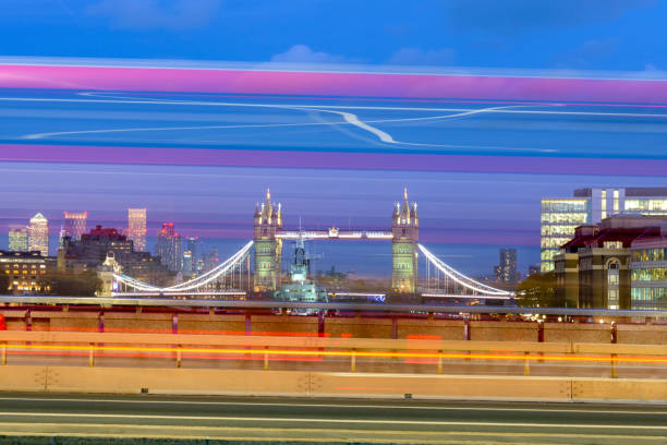 istock Tower of London at night through traffic light trail 1354062336
