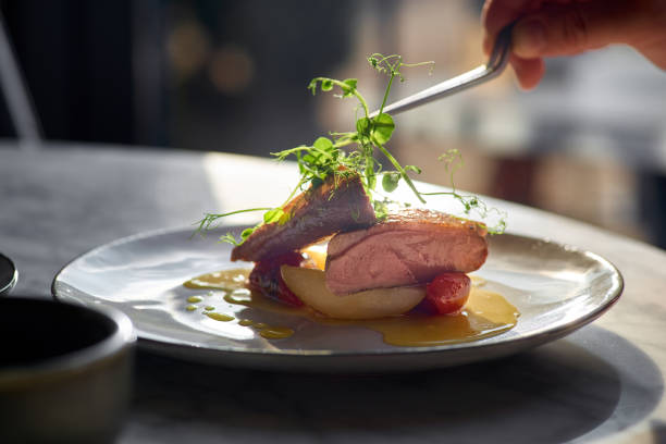 istock Duck breast with pears in orange-ginger sauce. 1354066727