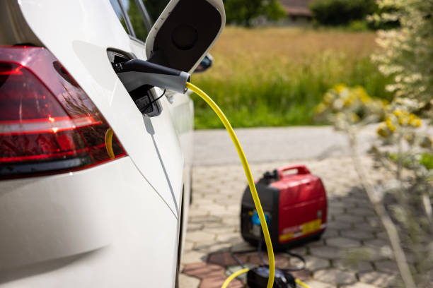 istock Charging an electric car at home 1354069438