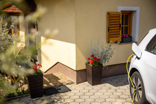 istock Charging an electric car at home 1354069641