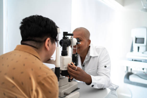 istock Ophthalmologist examining patient's eyes 1354070861