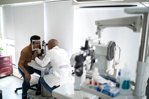 istock Ophthalmologist examining patient's eyes 1354071877
