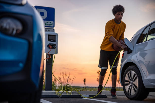 istock Basketball player charging an electric car 1354073505