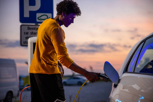 istock Basketball player charging an electric car 1354073712