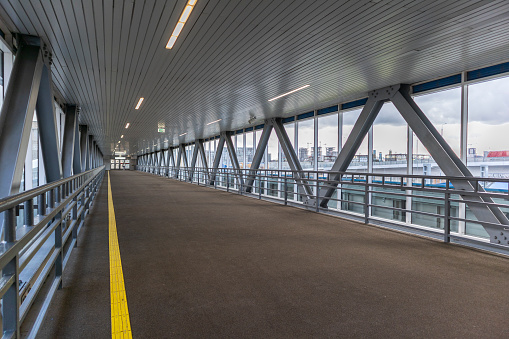 elevated passage corridor bridge geometric lines symmetry.concept transport hub.