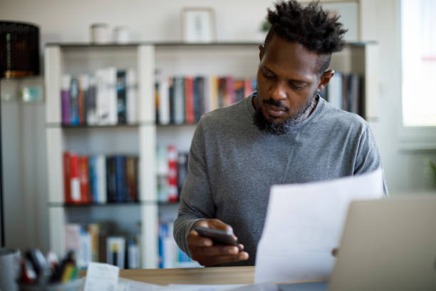 istock Mid adult man working at home 1354077493