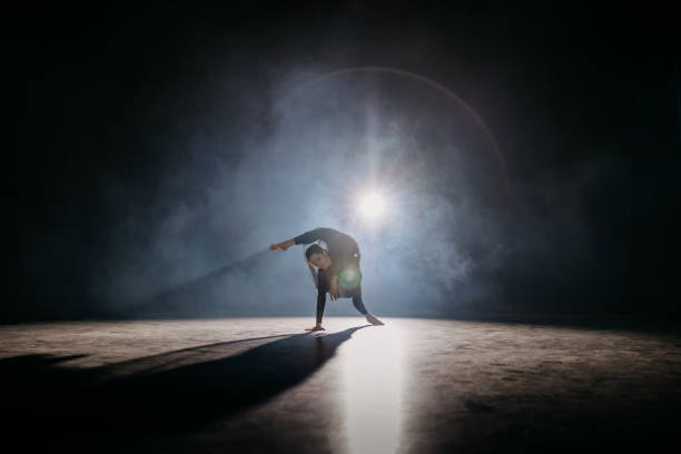 istock Young ballerina rehearsing on the stage 1354079274