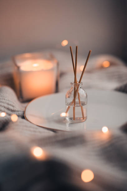 istock Cozy home atmosphere with perfume in glass bottle 1354082864
