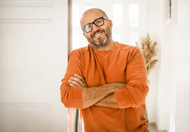 istock Mature adult man  ( entrance hall, home decor) 1354084572