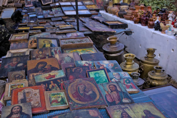 Kropyvnytskyi, Ukraine - September 29, 2021: Antique Flea market. Selling and buying antiques items and collectables porcelain. Bazaar antiques souvenir. Antiques market selling vintage objects.