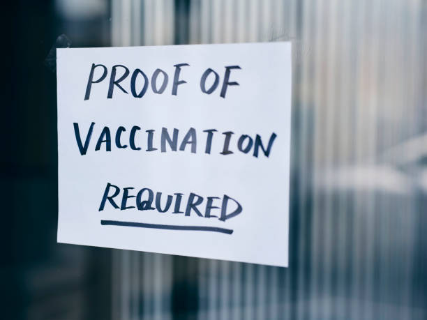 istock Business Wtih Vaccine Mandate Sign 1354085747