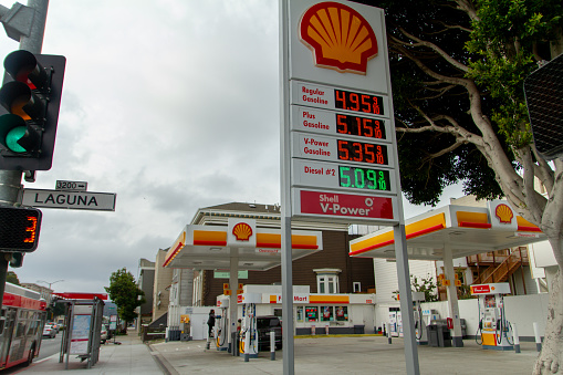 San Francisco, CA - November 18th, 2021: Drivers are paying record high gas prices at $5.35/gallon at the Shell station on HWY 101.