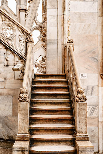Carved marble staircase with a figured balustrade on the roof of the Duomo. Italy, Milan. High quality photo