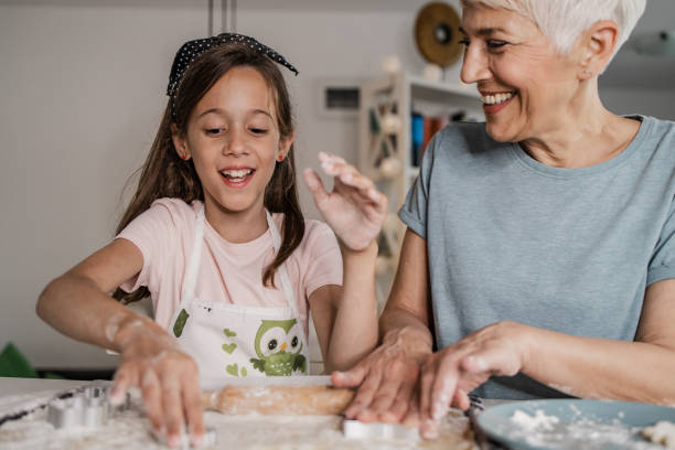istock Having fun with grandma in the kitchen 1354087695
