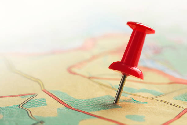istock Location marking with pin on map. Travel and journey concept. 1354091167