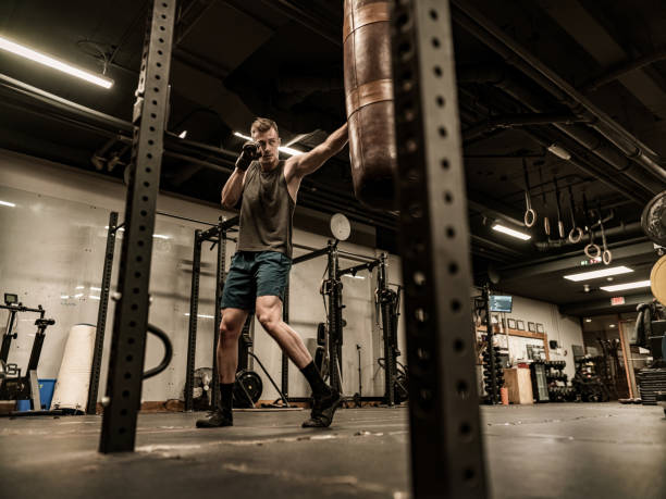 istock Young Man boxing in the Gym 1354092023