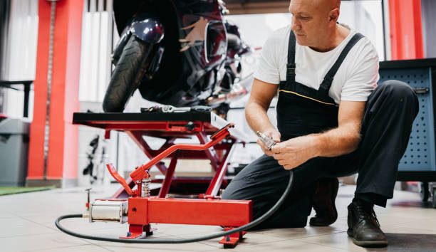 istock The mechanic uses a hydraulic platform 1354096957