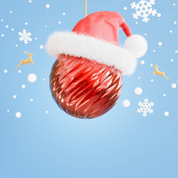 istock balls wearing christmas hats on blue background 1354098099