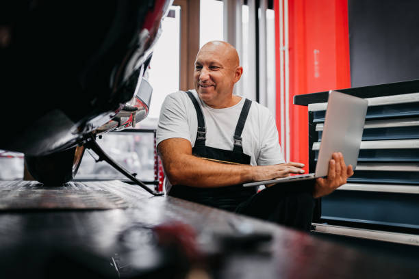 istock The mechanic uses a laptop 1354102517