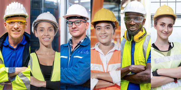 istock group of manual workers engineering standing with confident at work place. Concept of smart industry worker operating. Diversity of people of men and women of Asian, Caucasian, African. 1354106371