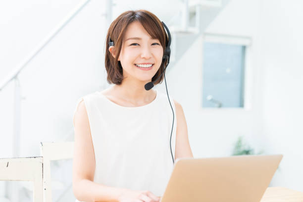 istock young asian woman studying with a laptop computer,correspondence course 1354109287