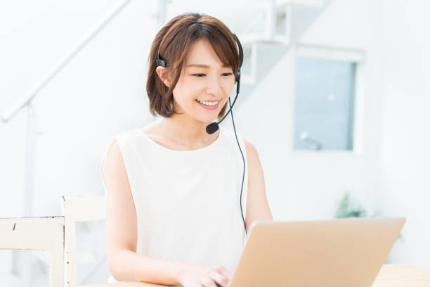 istock young asian woman studying with a laptop computer,correspondence course 1354109950