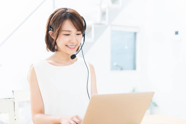 istock young asian woman studying with a laptop computer,correspondence course 1354110253