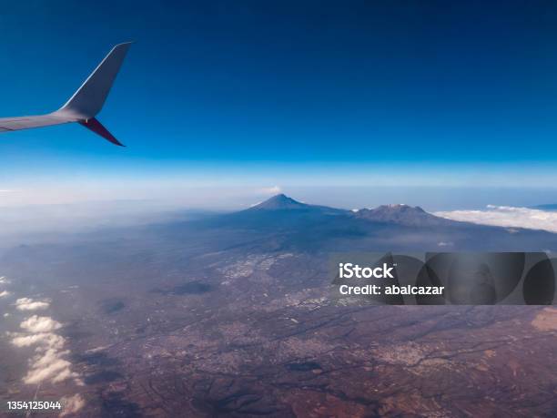 Popocatepetl And Iztaccihuatl Volcanoes Mexico Stock Photo - Download Image Now - Aerial View, Airplane, Landscape - Scenery
