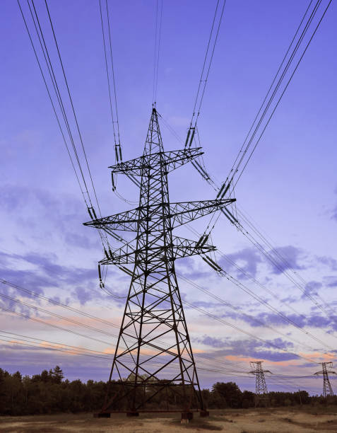 istock power line pylons during sunset with beautiful saturated sky. 1354125361