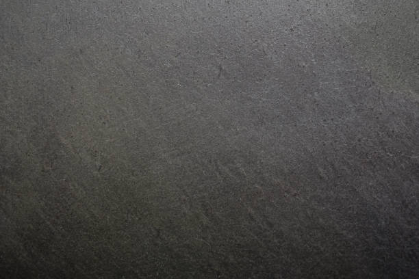 istock Dark grey sand stone background. Perfect wall 1354141846