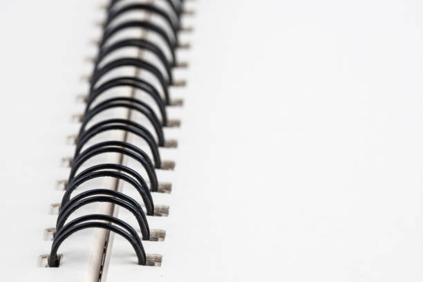 A mosquito coils object is on a black background. A spiral is also on a white page