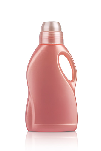 large pink plastic container for liquid detergents, isolate on a white background