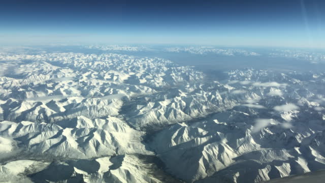 Flying over Siberian Mountains in Russia