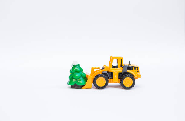 istock truck with  Christmas tree toy on white background 1354150630