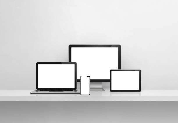 istock Computer, laptop, mobile phone and digital tablet pc. white concrete shelf banner 1354155051