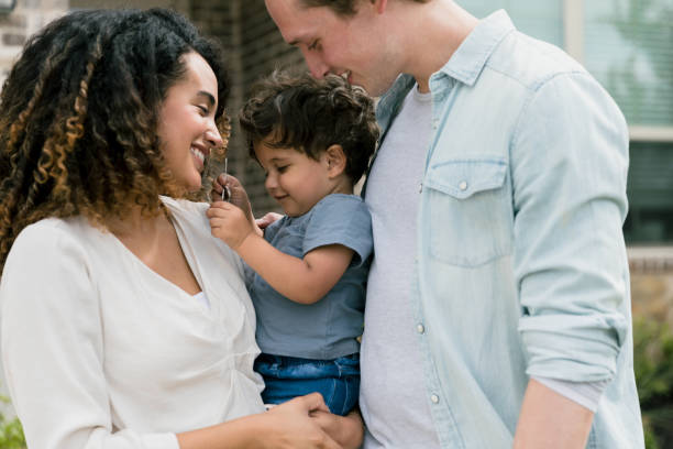 istock Cheerful couple with adorable toddler son 1354166828