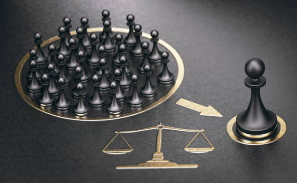 Class action lawsuit or collective redress. Legal concept. 3d illustration of many pawns over golden and black background representing a class action or a collective redress concept. lawsuit stock pictures, royalty-free photos & images