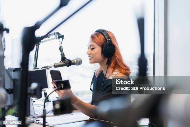 Focus On Female Podcaster Live Streaming Show Stock Photo - Download Image Now - Podcasting, Journalist, Live Streaming