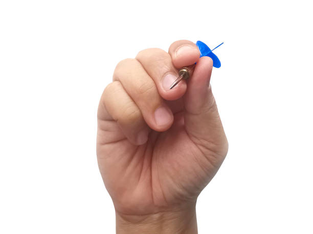 istock hand holding darts arrow isolated on white background. concept marketing target 1354171222
