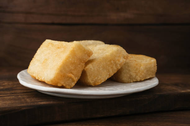istock Jadah Goreng or Fried sticky rice cake is Javanese traditional cake. 1354173374