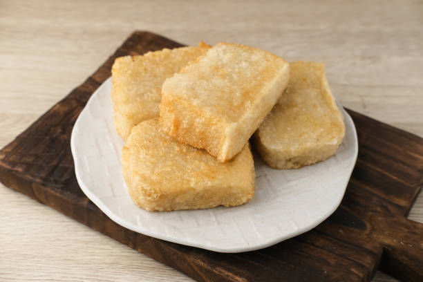 istock Jadah Goreng or Fried sticky rice cake is Javanese traditional cake. 1354173797