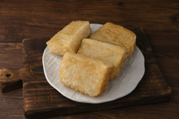 istock Jadah Goreng or Fried sticky rice cake is Javanese traditional cake. 1354174032