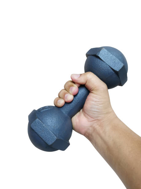 istock Hand holding dumbbell isolated on white background 1354175352