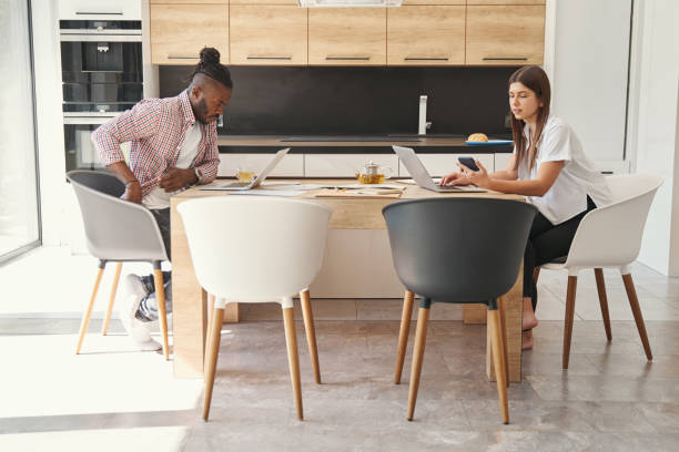 istock Two focused young people working from home 1354175753