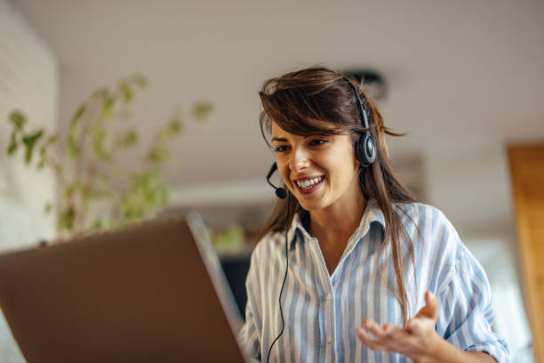 istock Lovely caucasian woman, grading her students, online 1354178956